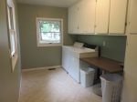 Great laundry room off of the dining area and roadside entry.